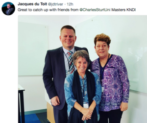 Image: Tweet by Jacques "Great to catch up with friends from @CharlesSturtUni Masters KNDI" du Toit about the T21C Conference "